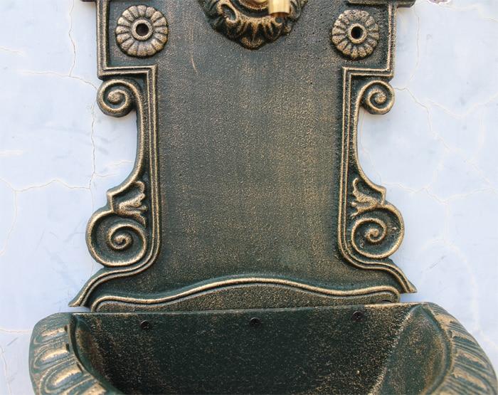 Fontaine murale de jardin en fonte