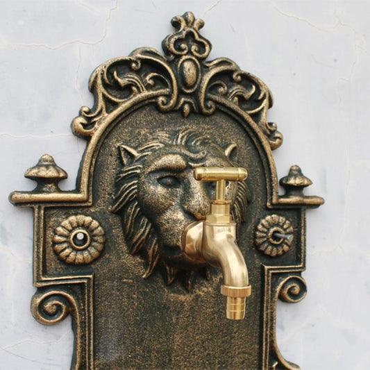 Fontaine murale à tête de lion