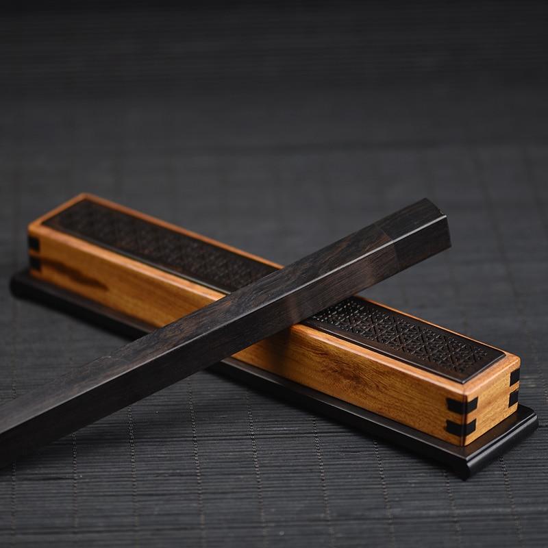 Porte encens en bois sculpté