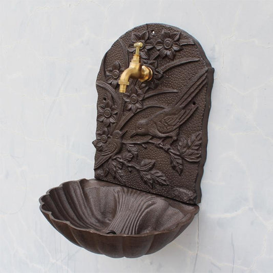 Fontaine murale ancienne fonte